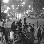"The main stem of the East Village at St. Mark's Place, where hippies gather to 'do their own thing'" reads the caption, from 1968.